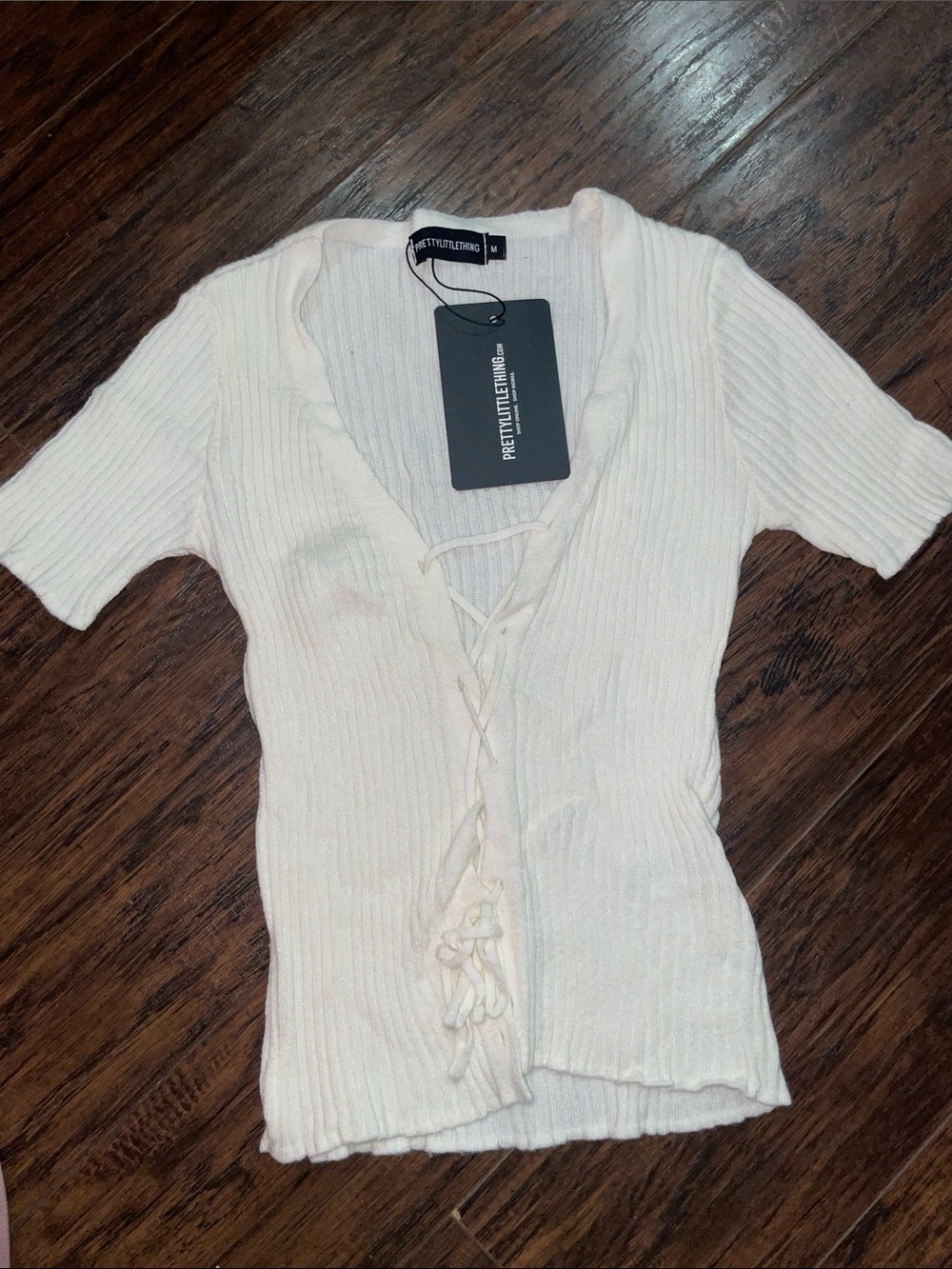 PrettyLittleThing Cream Ribbed Lace-Up V-Neck Short Sleeve Top